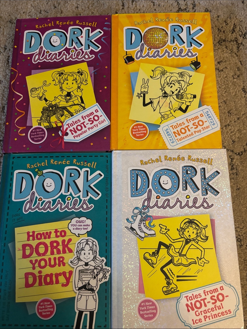 Dork Diaries Book Set by Rachel Renee Russell includes 2, 3, 3 1/2, & 4